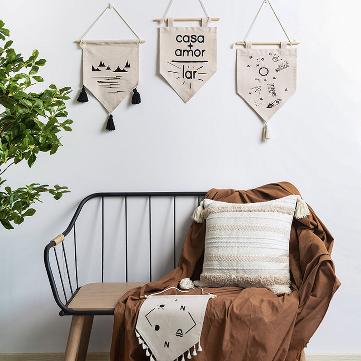 Decorative cotton wall hanging in pennant style with tassels and minimalist prints Stornfield