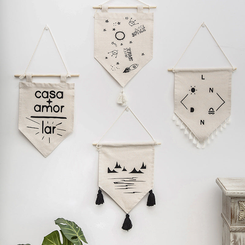 Decorative cotton wall hanging in pennant style with tassels and minimalist prints Stornfield