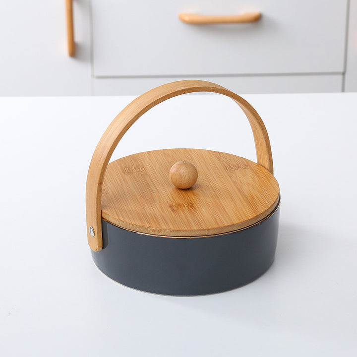 Round serving and storage set with bamboo handle and three-part interior divider