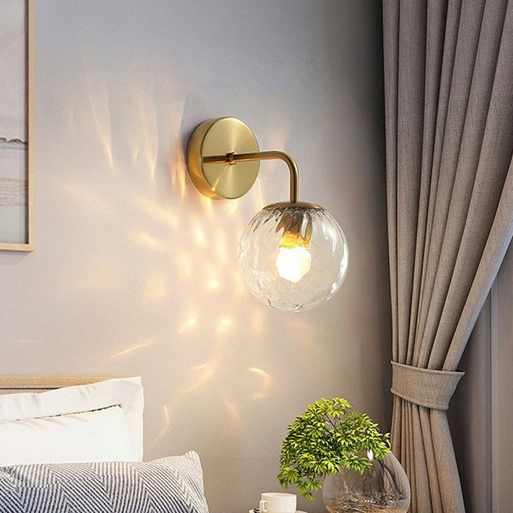 Ball Shaped Wall Lamp Minimalist Clear Rippling Glass 1-Light Bedroom Wall Mounted Lighting with Bent Arm in Black/Gold | Stornfield