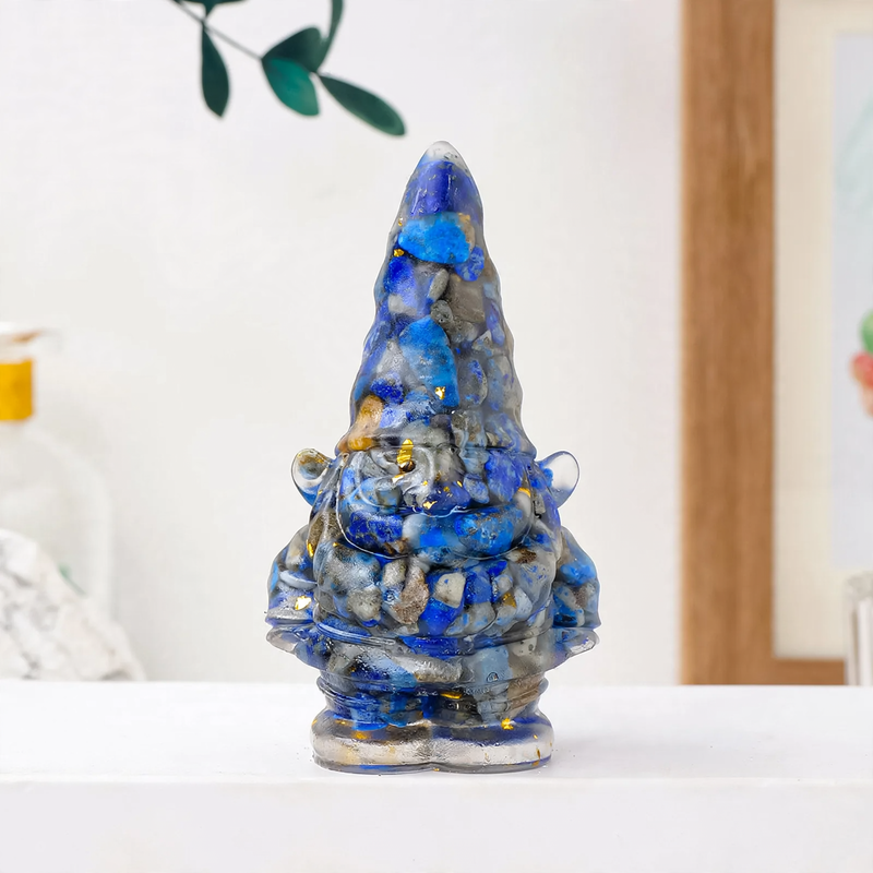Dwarf figure made of resin with gemstones