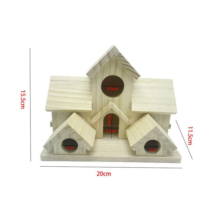 Decorative wooden birdhouse in country house style