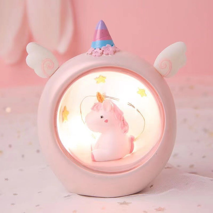 Decorative animal figure with pencil holder and light