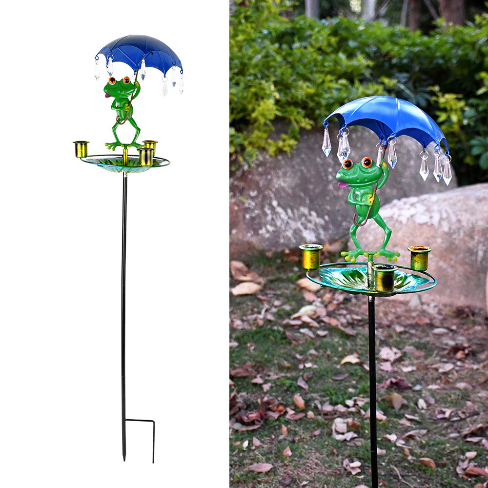 Birdbath made of stainless steel with frog motif