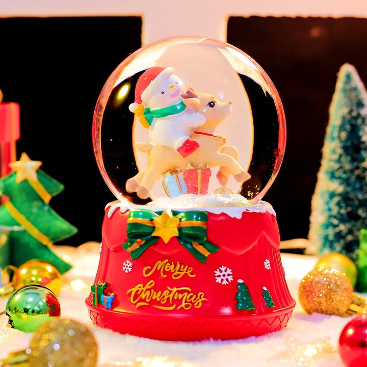 Christmas music box with glass sphere and snow effect