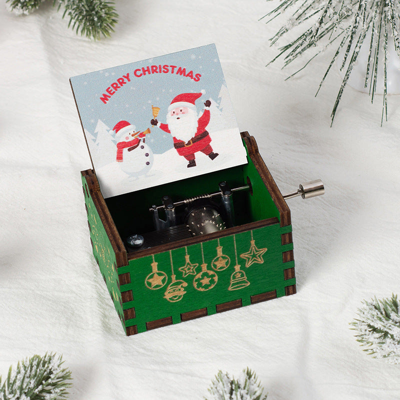 Manual wooden music box with crank
