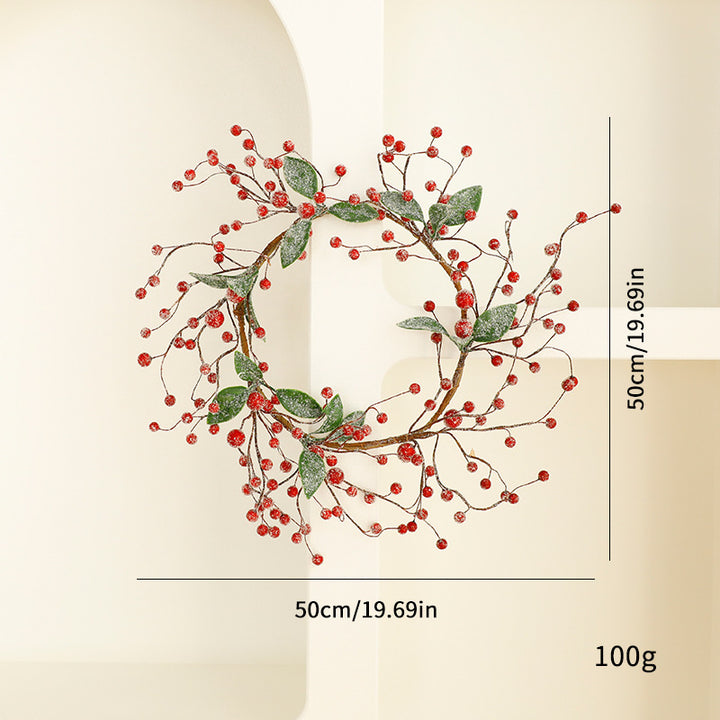 Christmas wreath with berries and pine needles