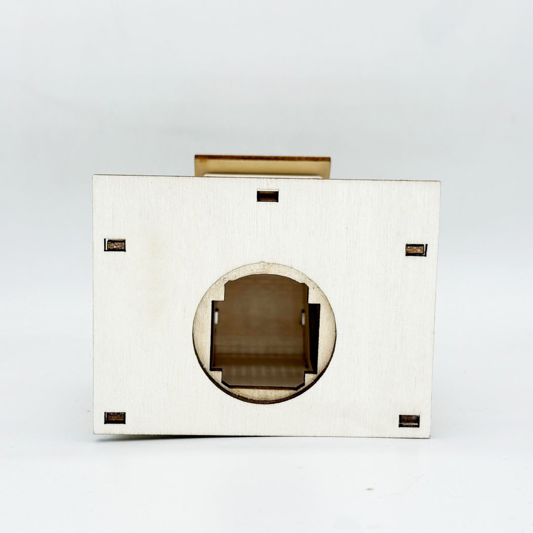 Illuminated wooden house for Christmas decoration