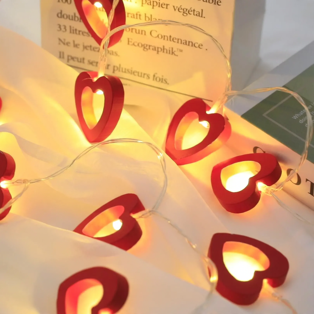 Decorative LED string lights with wooden motifs