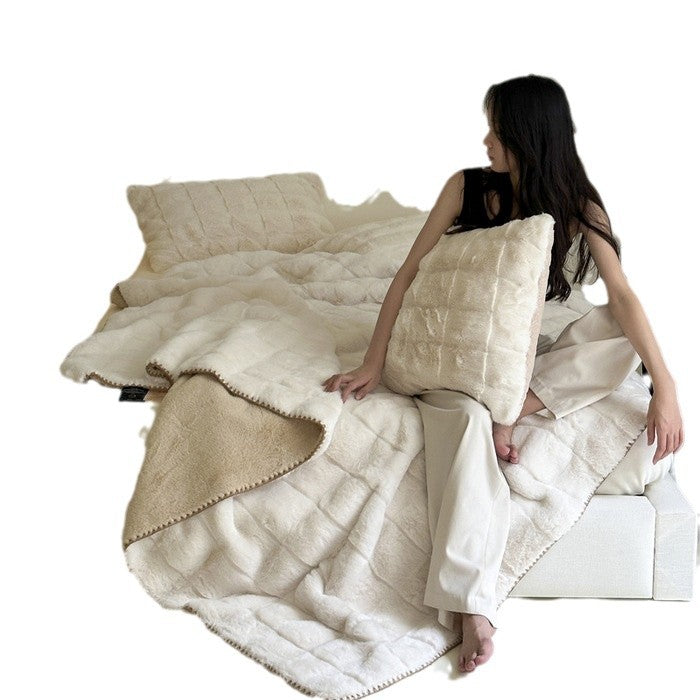 Scandinavian faux fur throw blanket with checkered pattern