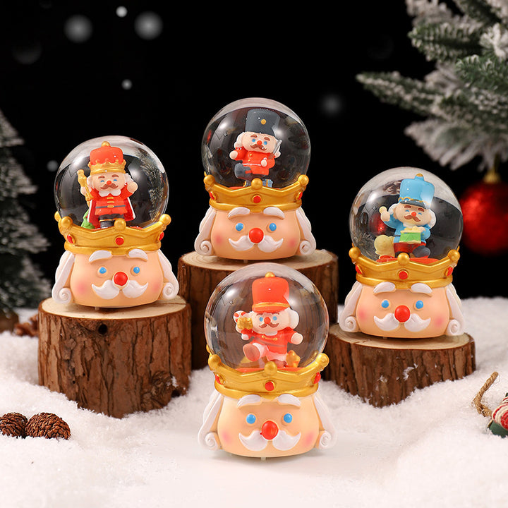 Glowing snow globe with Christmas motifs