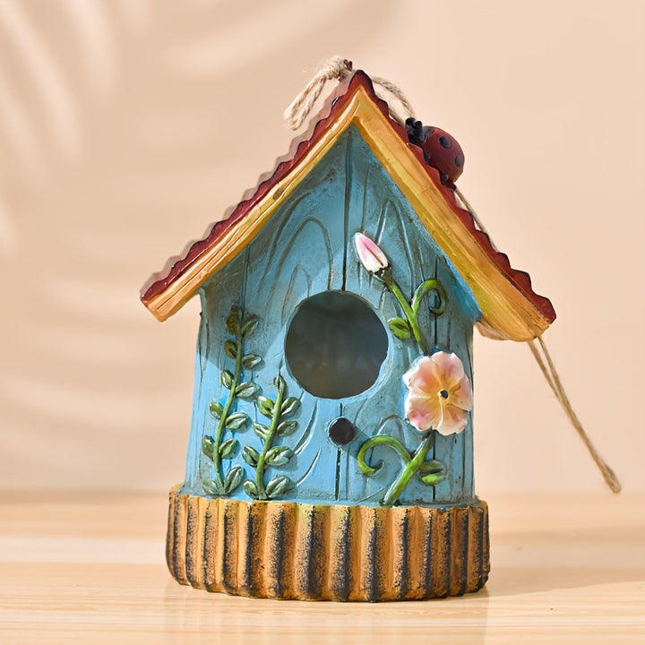 Decorative birdhouse made of resin for garden and balcony