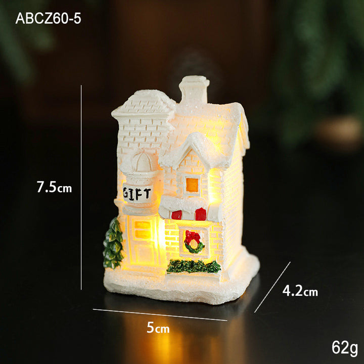 Illuminated miniature snow house made of resin