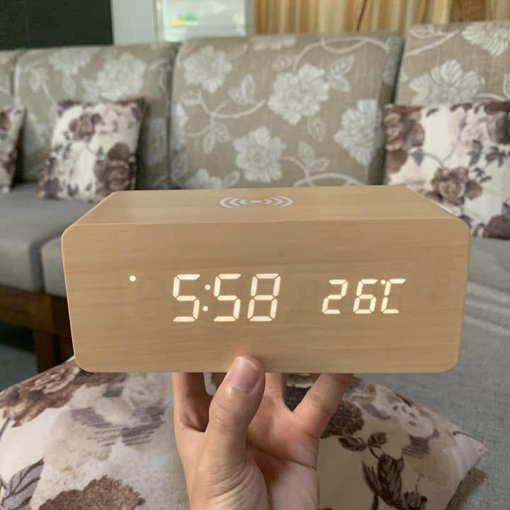 Wooden digital alarm clock with wireless charging function for smartphones