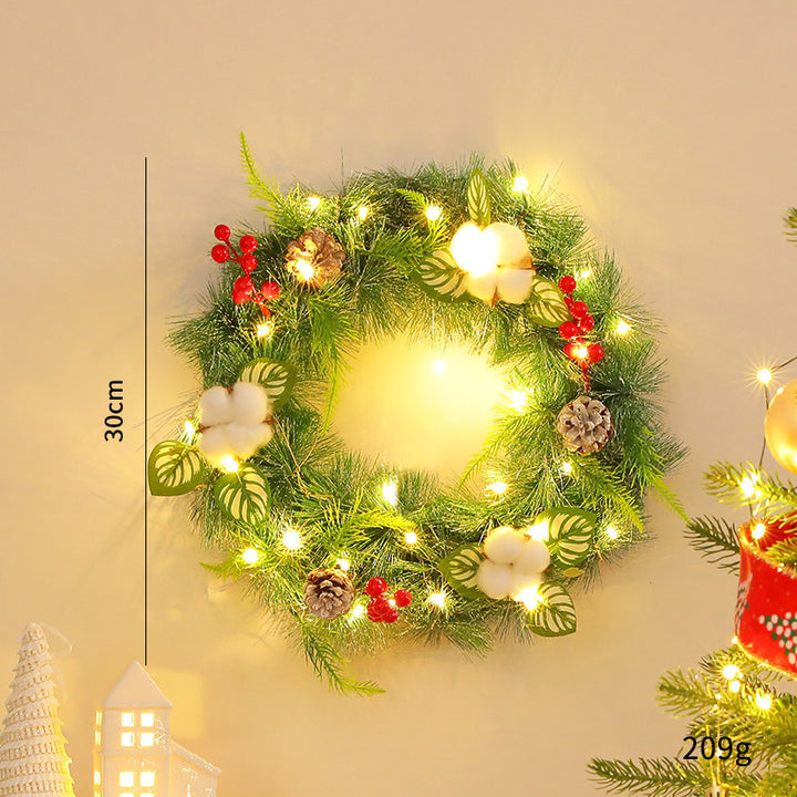 Decorative Christmas wreath with cones and LED