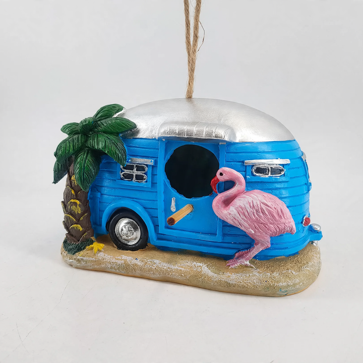 Decorative birdhouse in flamingo design made of resin