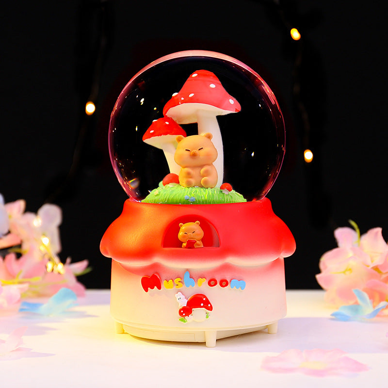 Fairy-tale snow globe with music and light