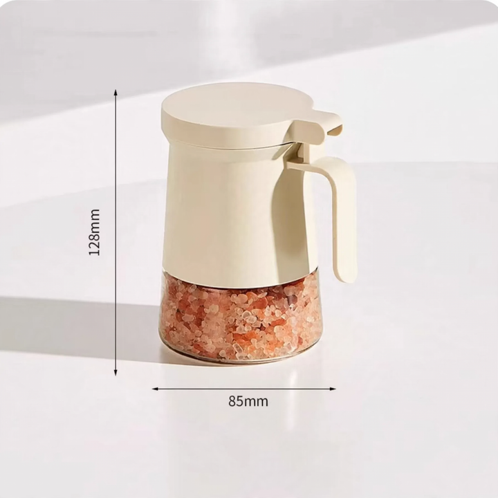 Sealed spice container made of glass with spoon