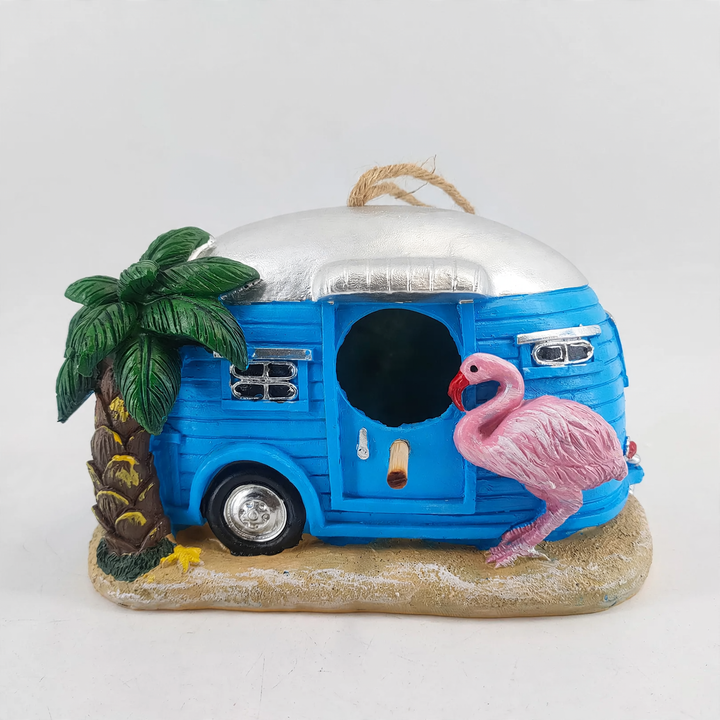 Decorative birdhouse in flamingo design made of resin