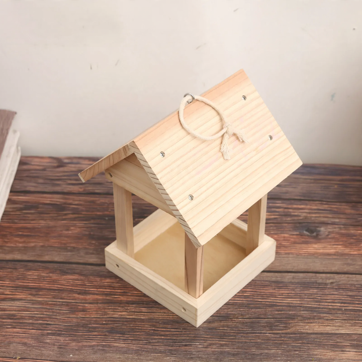 Open birdhouse made of wood as a feeding station