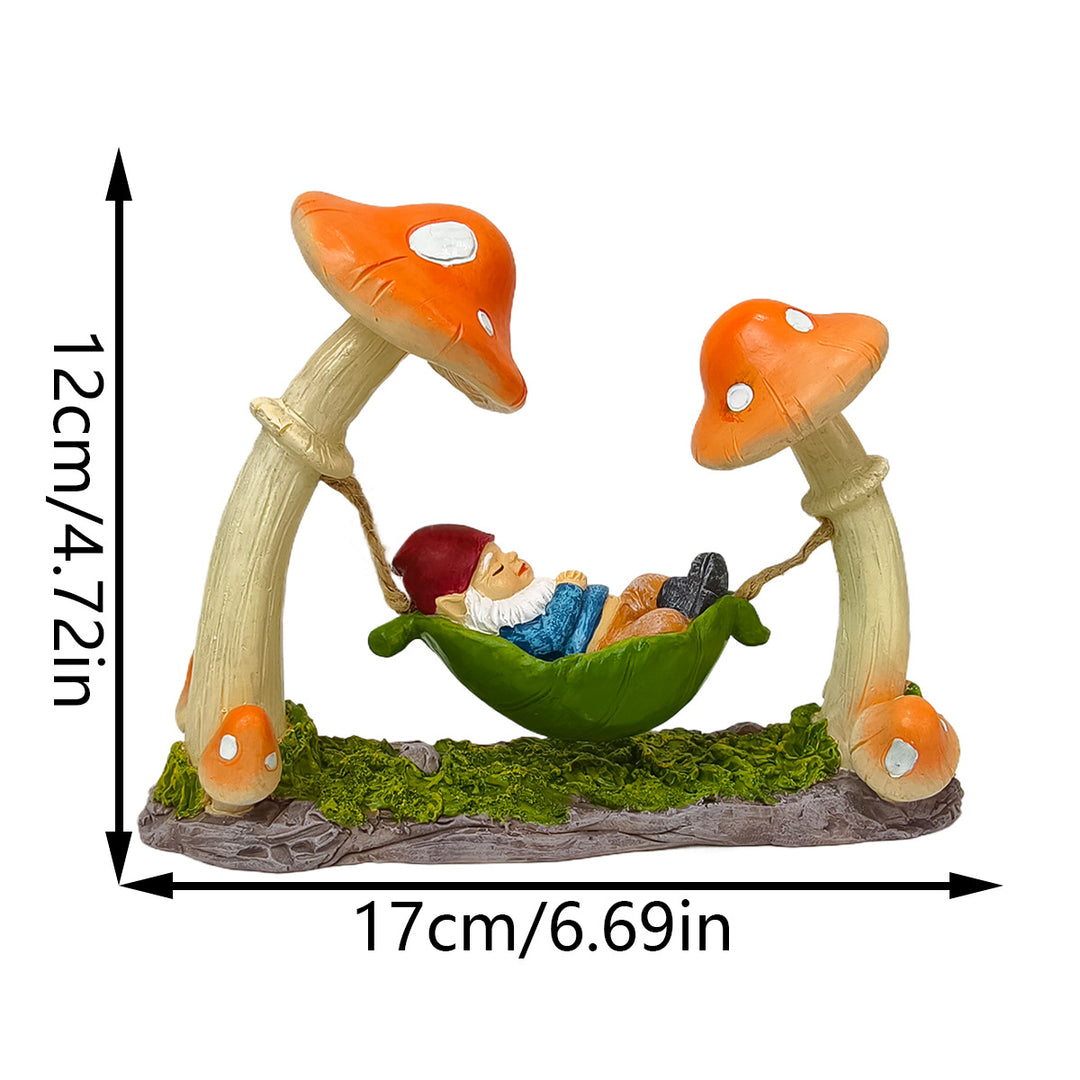 Garden decoration gnome in hammock made of synthetic resin