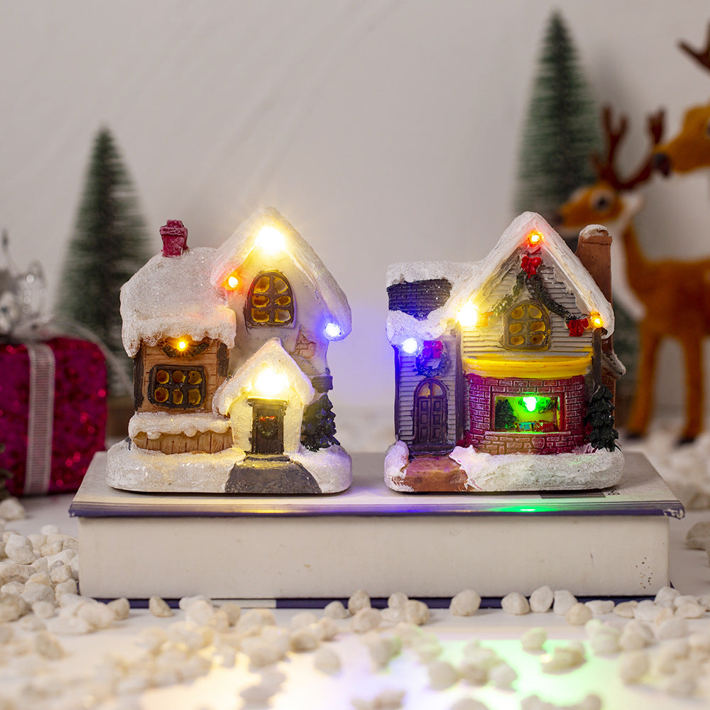 Illuminated Christmas cottage with LED light