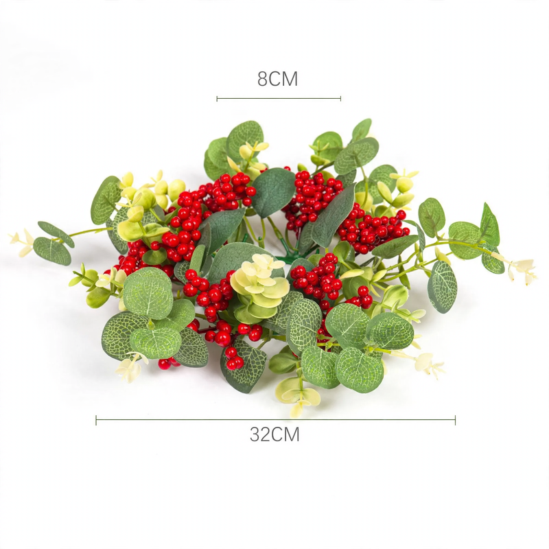 Christmas candle wreath with berries and cones