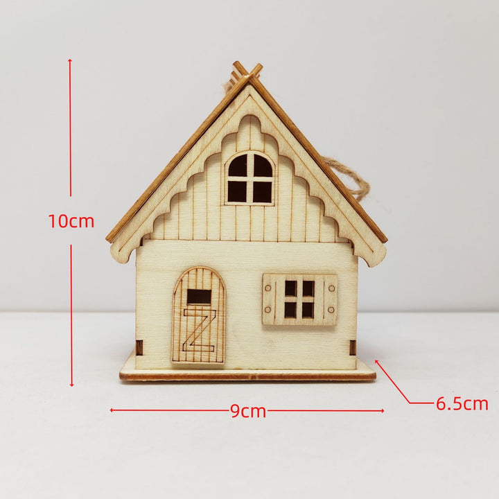 Illuminated wooden house for Christmas decoration