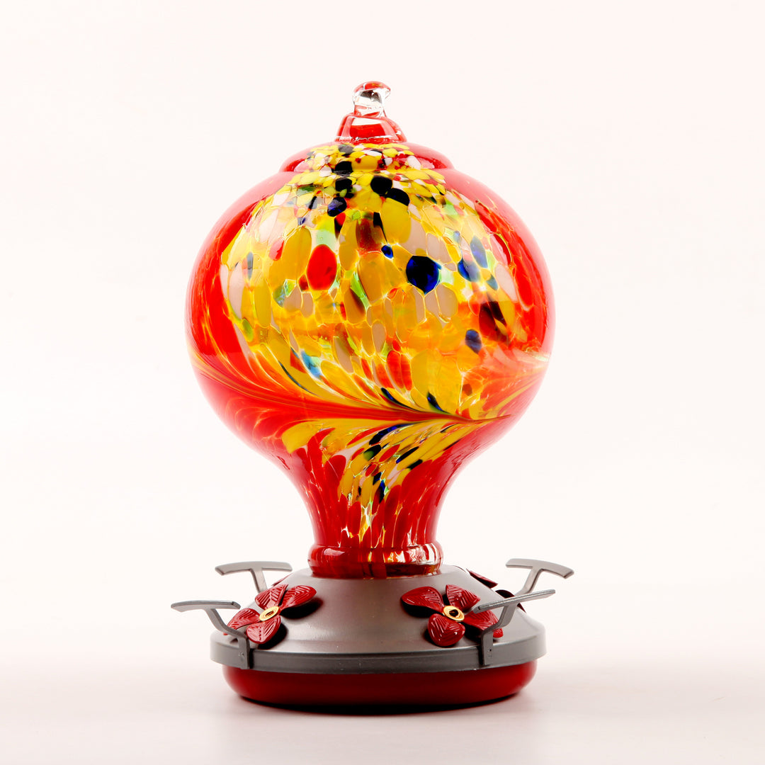 Decorative glass bird feeder for the garden