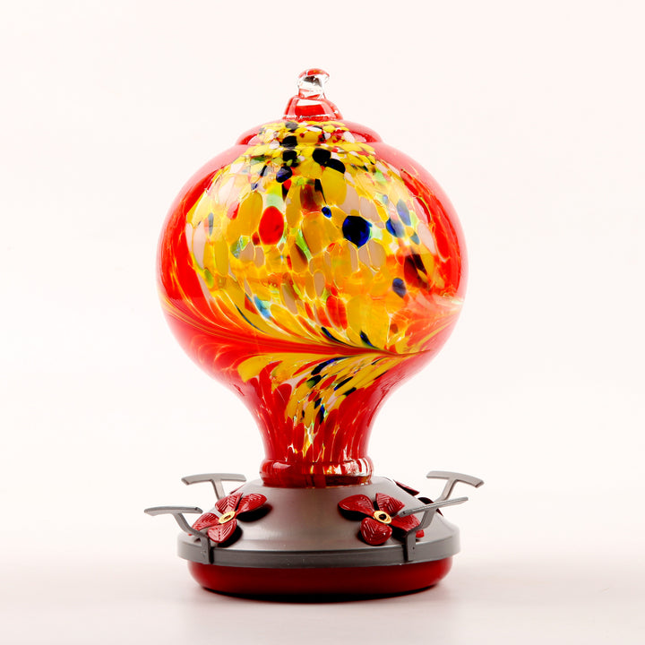 Decorative glass bird feeder for the garden