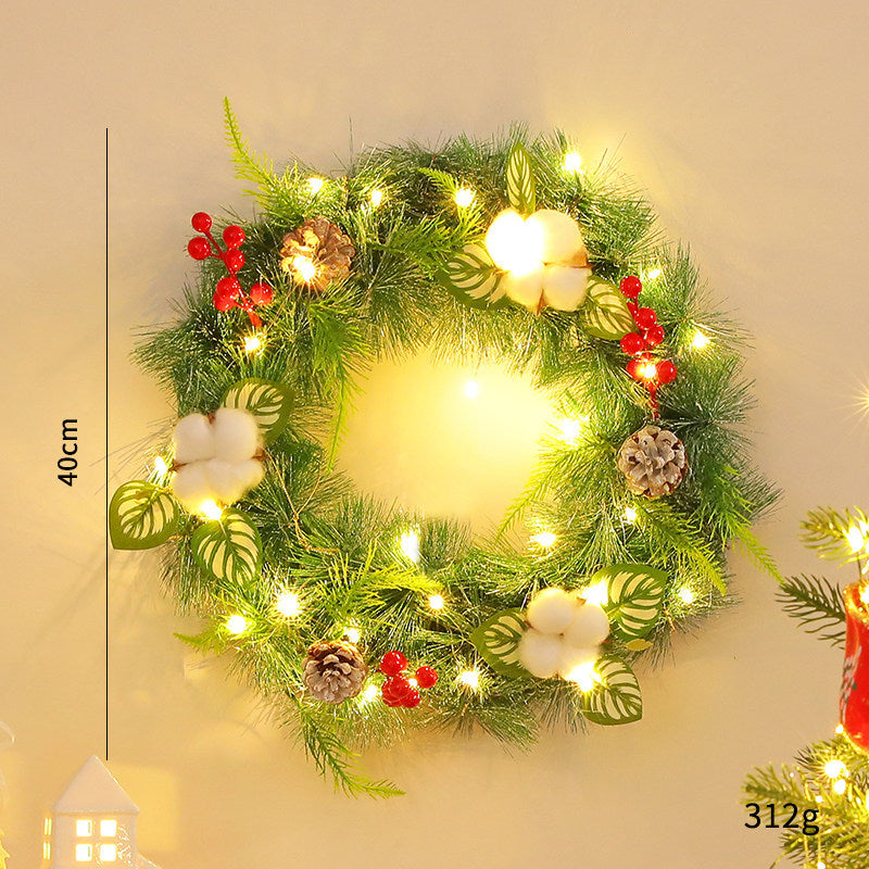 Decorative Christmas wreath with cones and LED