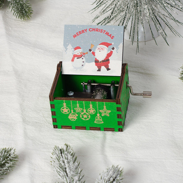 Manual wooden music box with crank