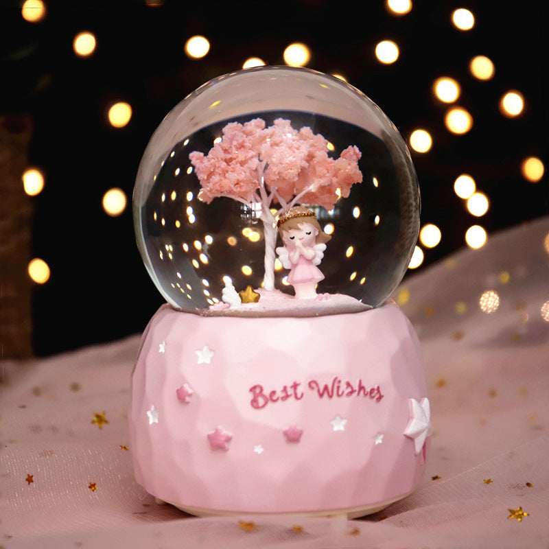 Music box snow globe with light and music