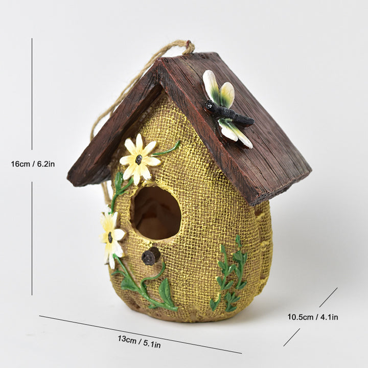 Decorative birdhouse made of resin for the wall