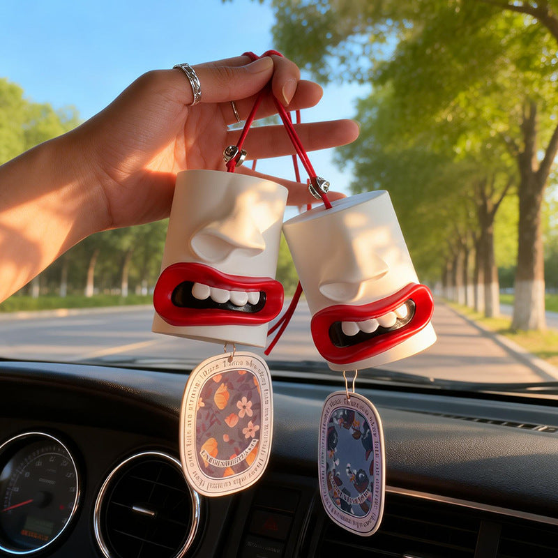 Car fragrance hanger with abstract lip design
