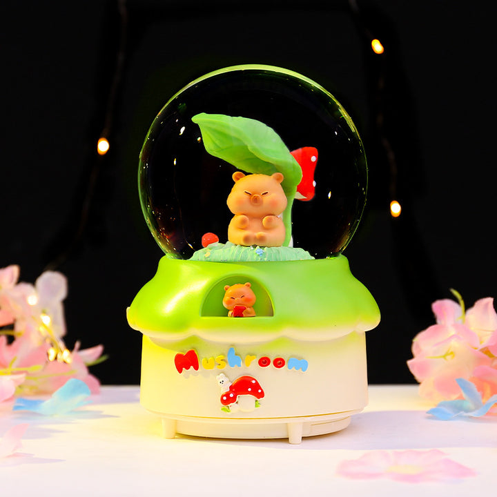Fairy-tale snow globe with music and light