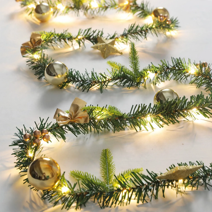 Christmas garlands and wreaths with lighting