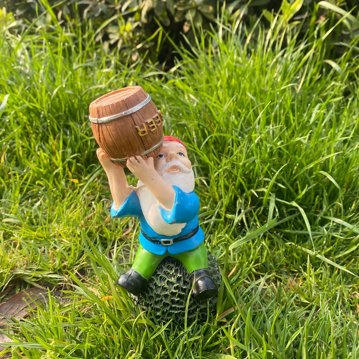 Gnome figure with red hat and hydrant motif