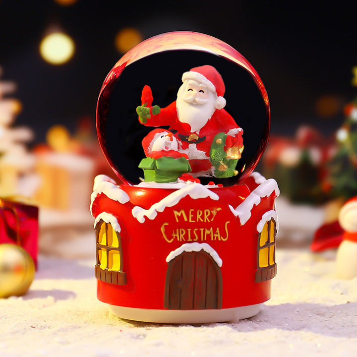 Christmas music box with glass sphere and snow effect