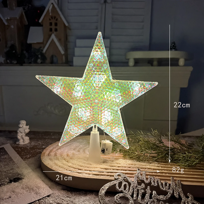 Illuminated Christmas tree top star made of plastic