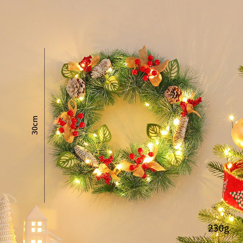Decorative Christmas wreath with cones and LED