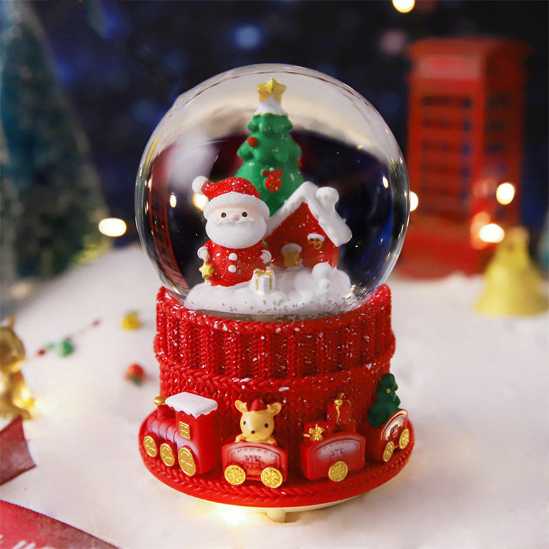 Christmas music box with glass sphere and snow effect