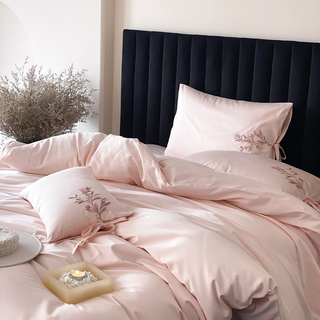 Embroidered cotton bedding with floral design