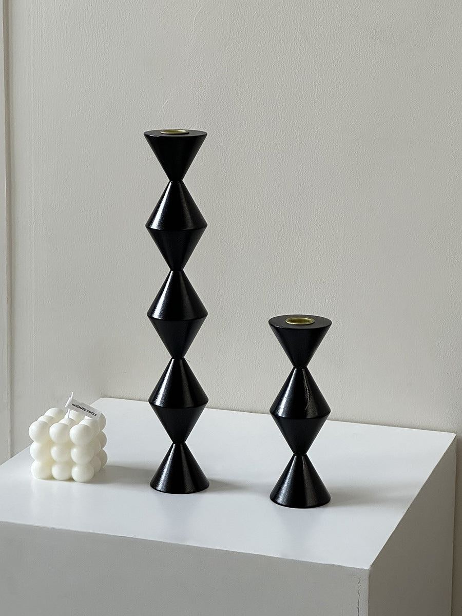 Decorative candle holder made of glass and wood