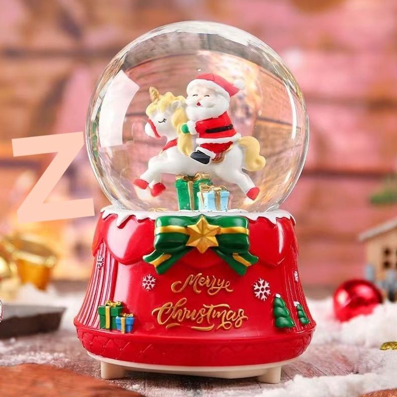 Christmas music box with glass sphere and snow effect