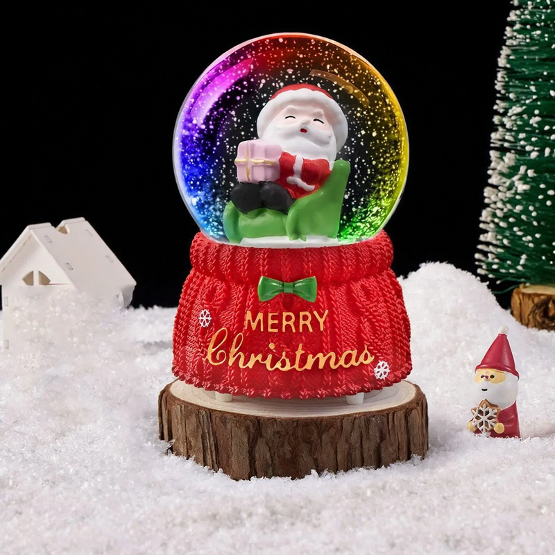 Christmas snow globe with light and music