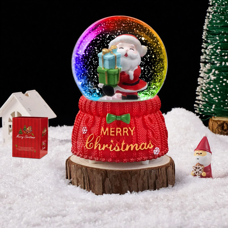 Christmas snow globe with music box and carriage design