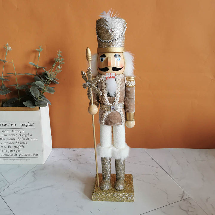 Decorative nutcracker figure made of wood with snowflake design