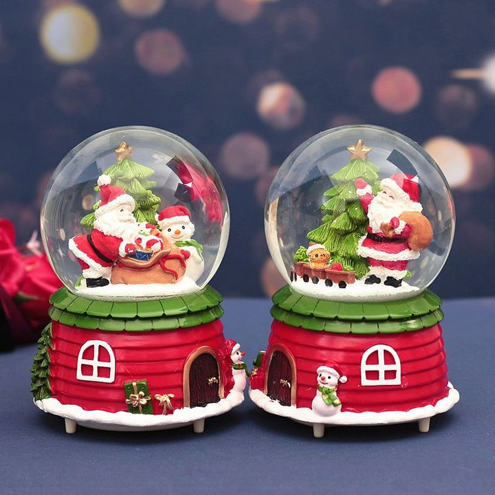 Christmas music box with snow globe and light