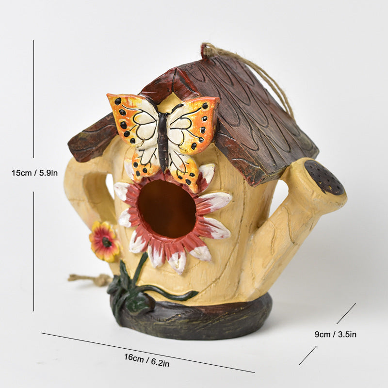 Decorative birdhouse made of resin for the wall